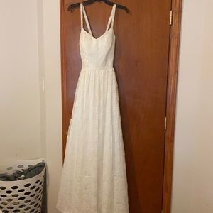 Ivory wedding dress.